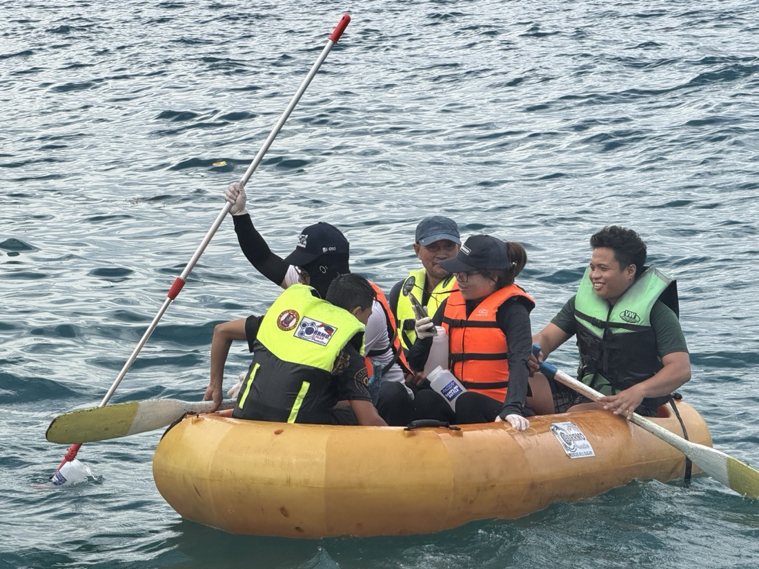 Part of the team at Iligan Bay sampling water from a small boat, accompanied by two Bantay Dagat, the local “sea guardians,” August 2026.